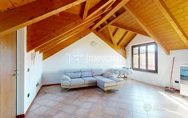 Bilocale mansardato con posto auto