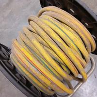 Tubo per innaffiare e carrello avvolgitubo