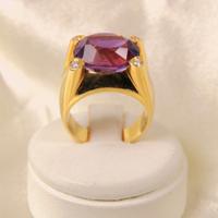 Anello in oro giallo 750, ametista e diamanti.