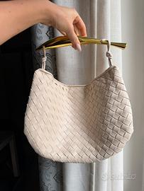 Borsa intrecciata con manico oro