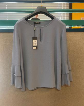 Blusa elegante Elena azzurro polvere con balze