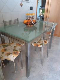 tavolo in vetro più sedie