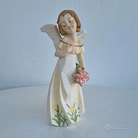 Statuetta decorativa raffigurante un angioletto