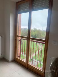 INFISSI  LEGNO CON DOPPI  VETRI