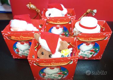 PERSONAGGIO DI NATALE CON MANI PRENSILI E CONFEZ.