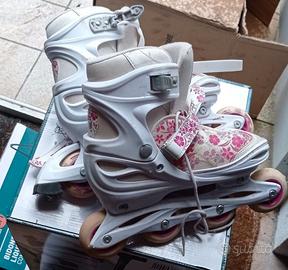 Pattini in linea bambina bianchi fiori