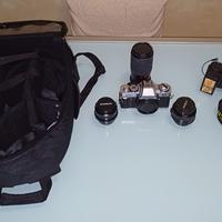 Macchina fotografica + obbiettivi + zaino