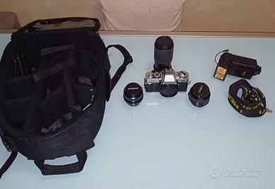 Macchina fotografica + obbiettivi + zaino