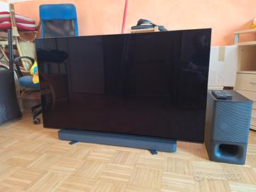 TV con Soundbar e Subwoofer