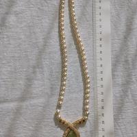 collana di perle e diamanti