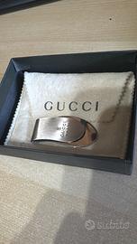 fermasoldi Gucci autentico