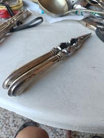 schiaccia chele in argento