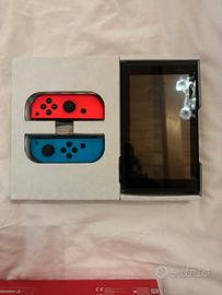 Nintendo switch 1 con un mese di vita + 2 giochi