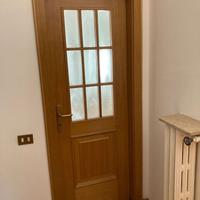 Porta vetrata in legno massello