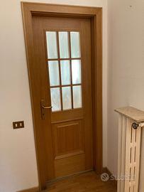 Porta vetrata in legno massello