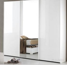 armadio a 3 ante scorrevoli con cassetti interni