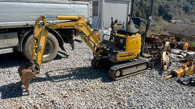 New Holland Kobelco E10SR + Atlas SB52
