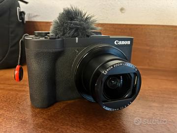 Fotocamera canon powershot v1 con accessori