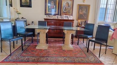 Tavolo da pranzo con piano in cristallo