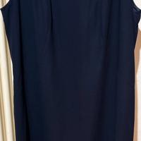 Scamiciata colore blu scuro.