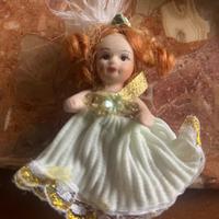 Bambola miniatura