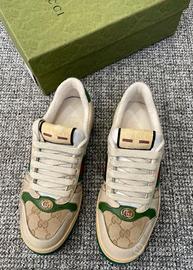 Sneakers basse con lacci e smalto GG