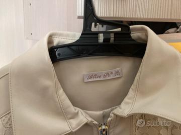 Giacchina bianca con pizzo
