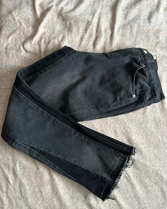 Jeans neri a zampa