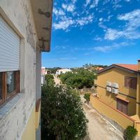 Appartamento con cortile e garage