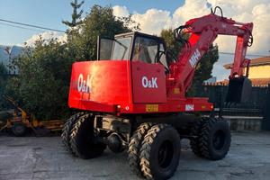 E142 - ESCAVATORE O&K MH4