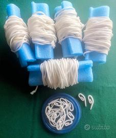 Cordoncini e gancetti per tende