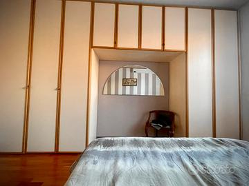 Armadio a ponte 5 ante + 4 sopra