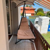 Sdraio a dondolo con ombrellino