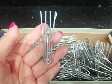 Ganci per tende acciaio tutti nella scatola
