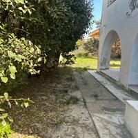 Appartamento con veranda e cortile