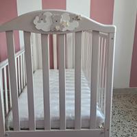 Cameretta neonato e seggiolone pappa