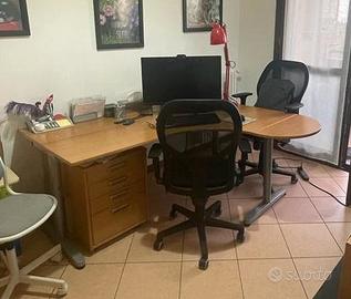 scrivania Galant legno ikea ad angolo con cassetti