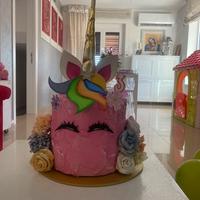 Torta e decorazioni unicorno