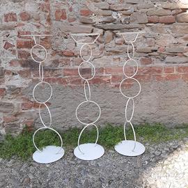 Tre alzate in metallo 