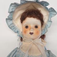 Bambola in porcellana 5