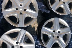 DACIA SANDERO  4 CERCHI ACCIAIO + COPERCHI 16"/205
