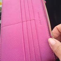 portafoglio o pochette a mano michael corse 