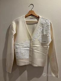 Cardigan bianco con paillettes