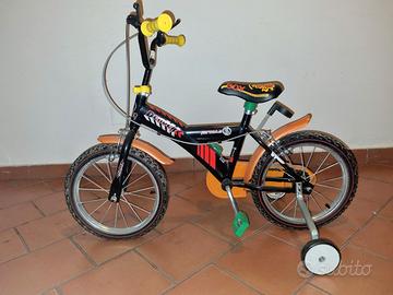Bici bambino 16” pari al nuovo + rotelle
