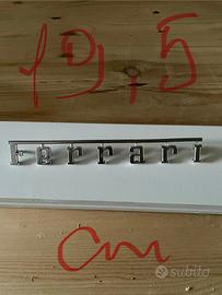 scritta ferraria tre pin