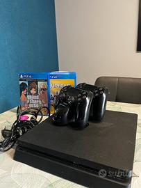 Ps4 slim + 2 giochi+ 2 joystick