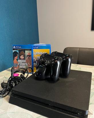 Ps4 slim + 2 giochi+ 2 joystick