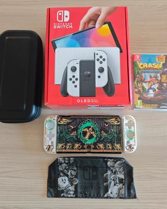 Nintendo switch OLED + gioco crash + accessori 