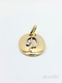 Ciondolo oro 18kt D con diamanti scritta Pomellato