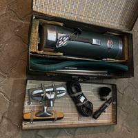 Aspiratore a traino vintage in una valigetta